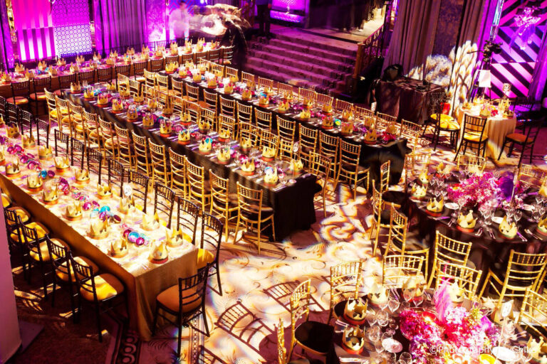 long dining tables in the ballroom of The Dorchester Hotel set up for a Bat Mitzvah event