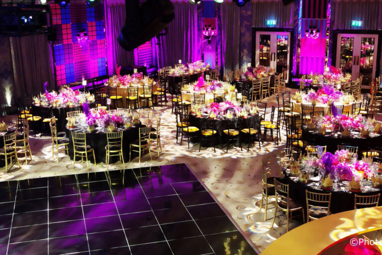 dining tables in the ballroom of The Dorchester Hotel set up for a Bat Mitzvah event