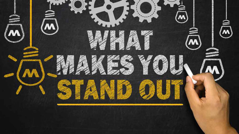 chalkboard sign with the words 'What Makes You Stand Out'