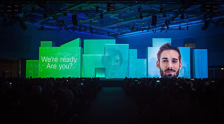 digital presentation on stage at Cisco Live by George P. Johnson