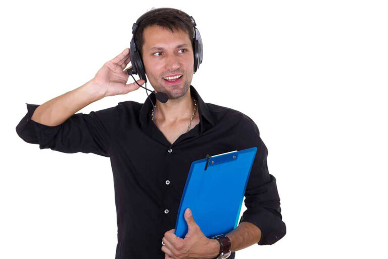 event coordinator with clipboard and radio headset