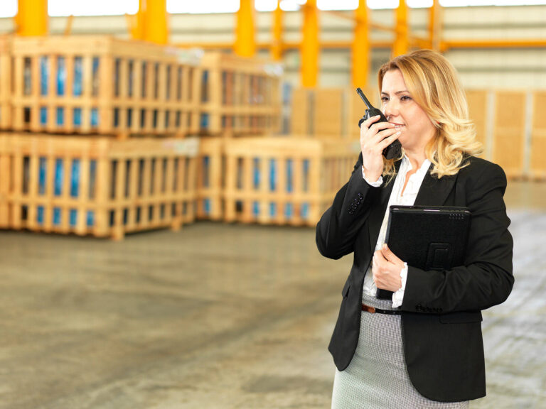 event planner speaking into a walkie talkie