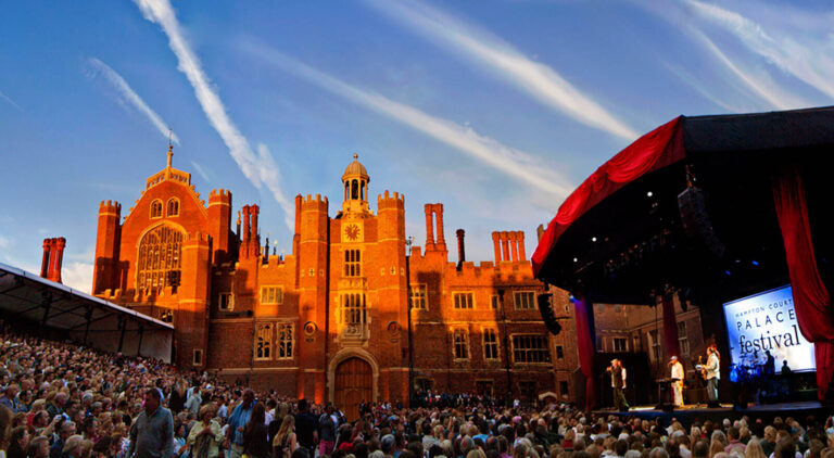 Stage and crowd outside Hampton Court Palace for the Hampton Court Palace festival event, UK