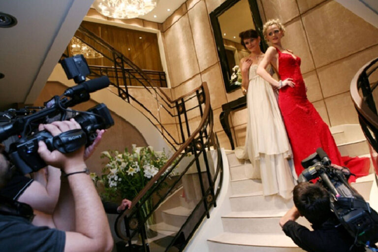 Jewelry presentation with models on staircase at Harry Winston's stand at Baselworld Trade Show 2007