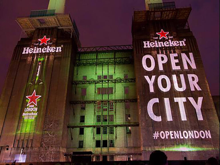 Battersea Power Station lit up with projections for Heineken Open Your City experiential marketing event London