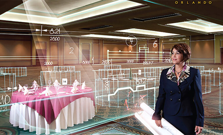 a hotel event co-ordinator standing a hotel ballroom surrounded by room measurements