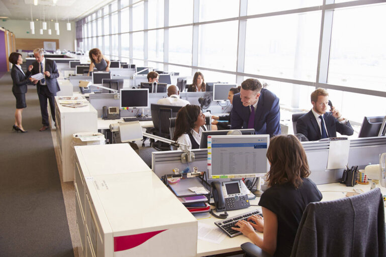 corporate event planners at their desks