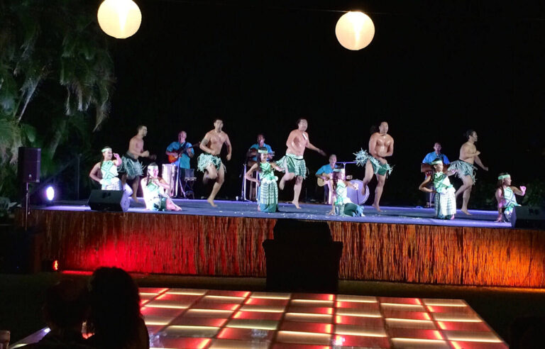 Hawaiian dancers on stage at an incentive travel program event