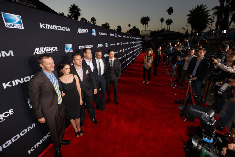 people on red carpet at Kingdom movie premiere event