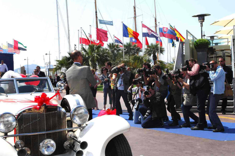 crowd of photographers for John Water's Love You to Death photo call, MIPCOM, Cannes