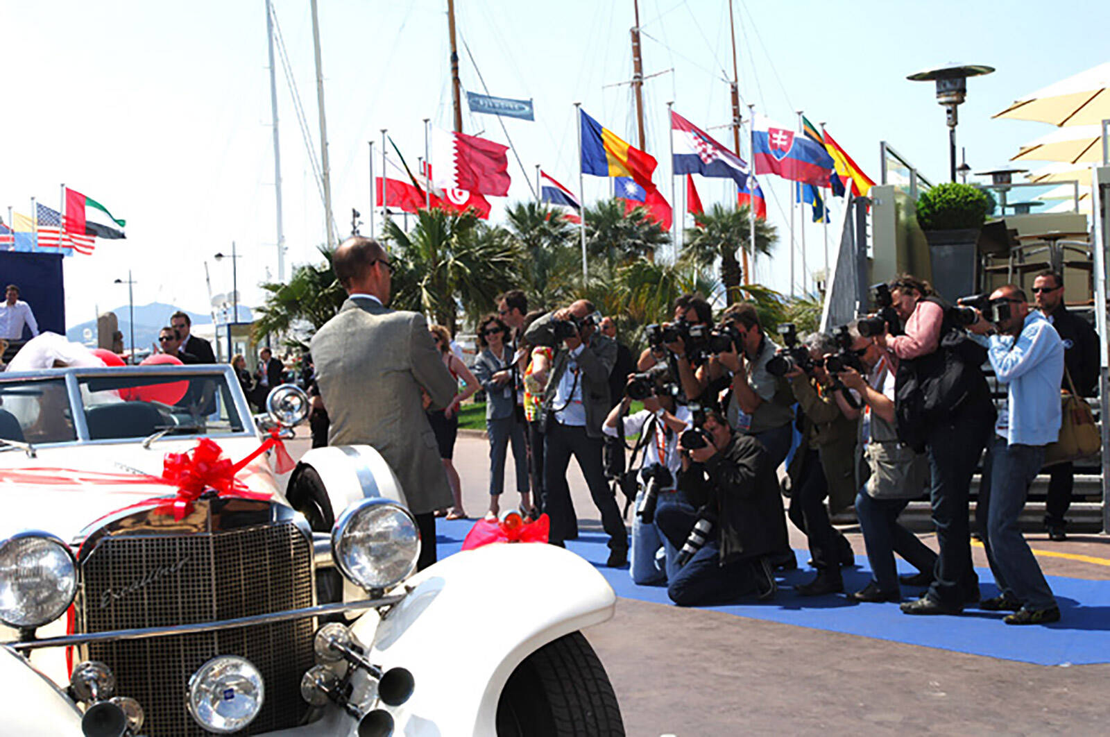 John Waters photocall for 'Love You to Death' TV show launch at MIP TV Festival in Cannes produced by Matt James of Leftfield Productions