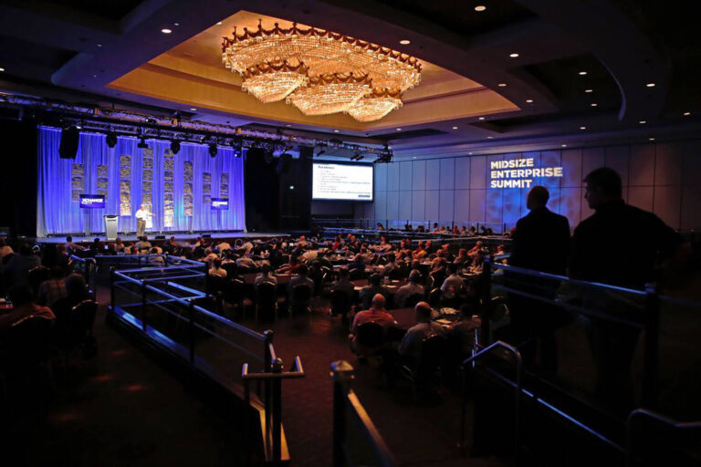 stage and auditorium at the Midsize Enterprise Summit conference