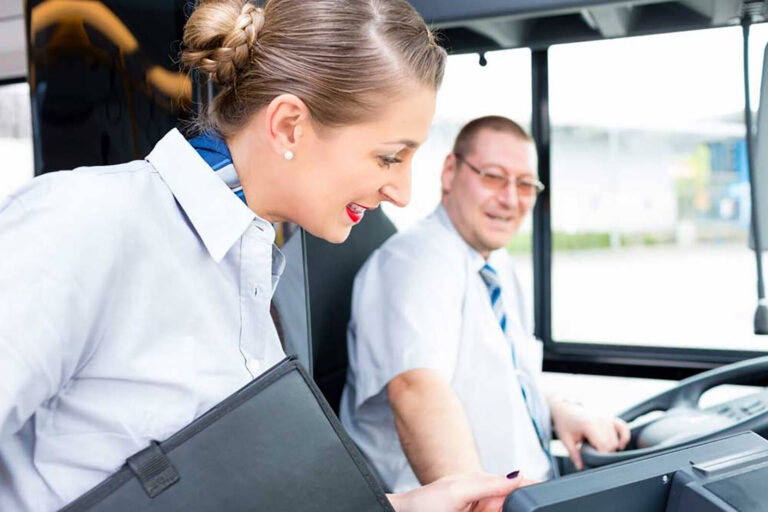 onsite event coordinator arranging travel with a coach driver