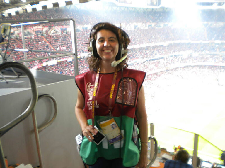 Onsite event coordinator with radio headset inside a stadium event
