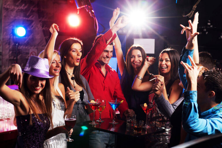 group of friends partying in a bar