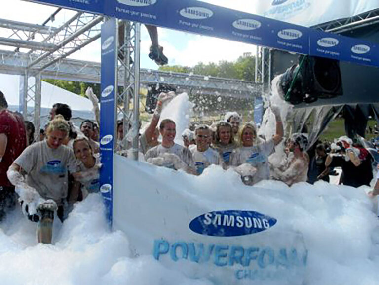People at a foam party at the Samsung PowerFoam Challenge with Tough Mudder experiential marketing event