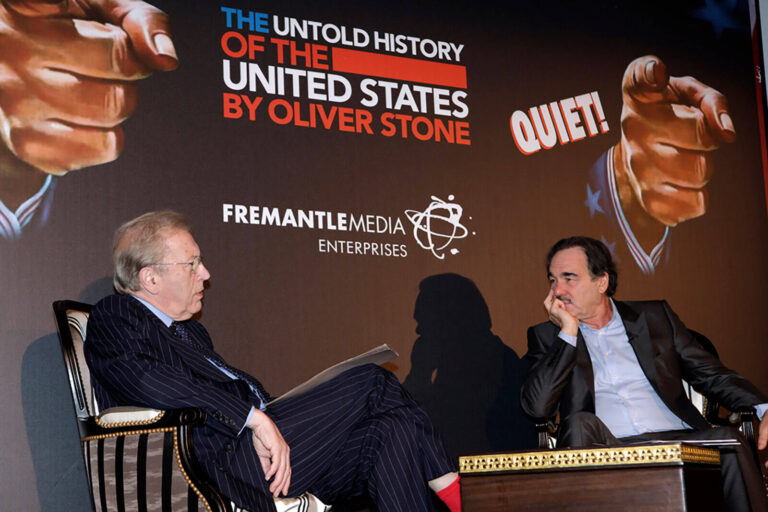 Sir David Frost interviews Oliver Stone on stage for Untold History of the United States launch event at MIPCOM, Cannes,